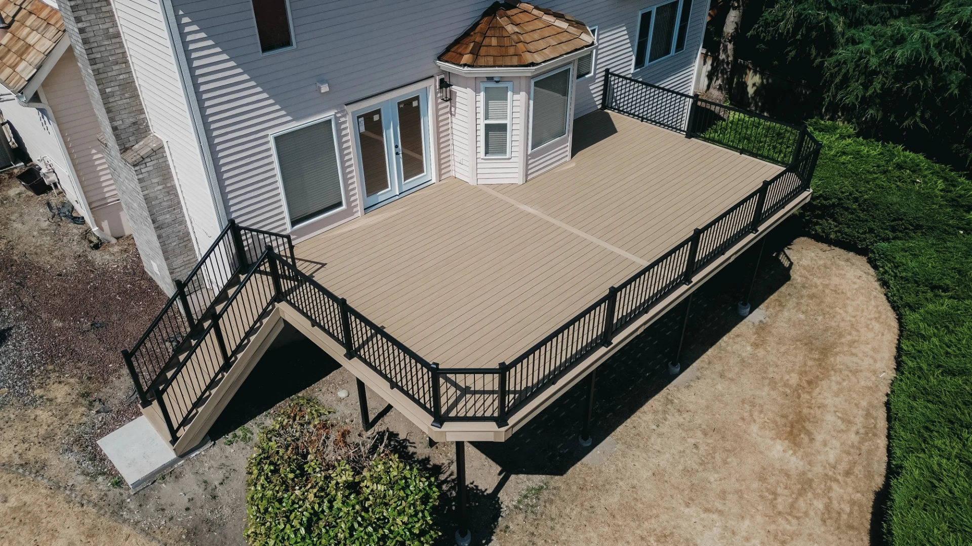 Aerial view of the residential deck with black aluminum railing in sugarcreek township oh