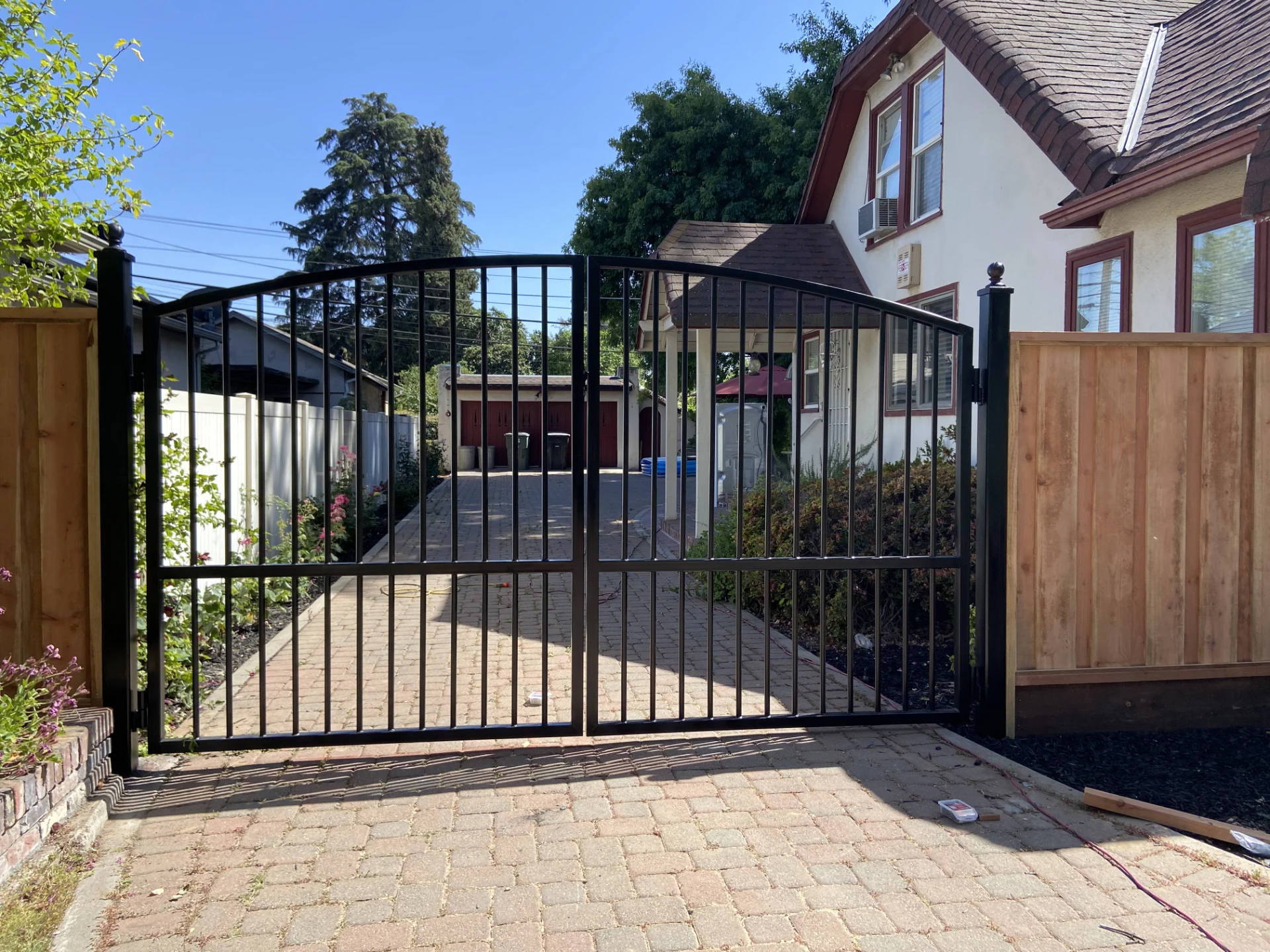 Gate type steel in residential house with wooden fence in miami valley oh