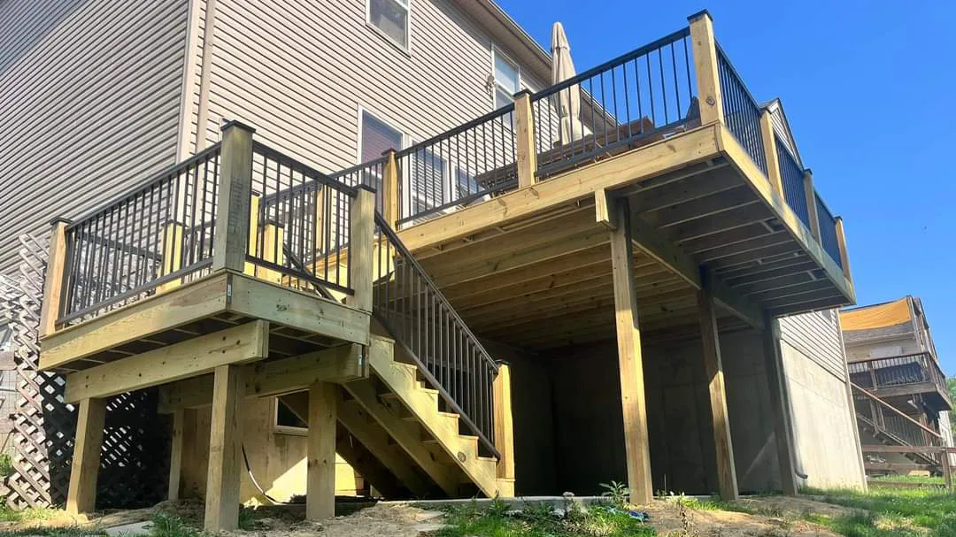 Wooden under deck framing with black railing in miami valley oh